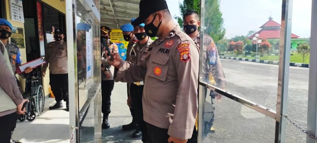 Gunung Mas,masuk polres gumas wajib scan barcode aplikasi peduli lindungi
