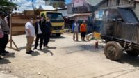 PENGASPALAN JALAN DI PANJAITAN