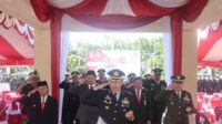 Kapolres Kapuas bersama wakapolres dan tamu undangan saat mengikuti upacara HUT Bhayangkara
