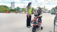 tegur pengguna sepeda listrik