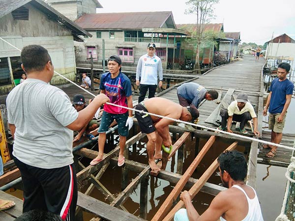 perbaiki jembatan