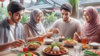 4 orang sedang makan di rumah makan