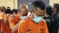 uang palsu pegawai garuda