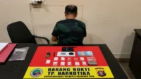 baihaki alias ibay 44 bersama barang bukti