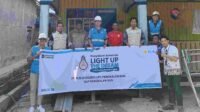 Saut Pandjaitan bersama penerima manfaat LUTD PLN