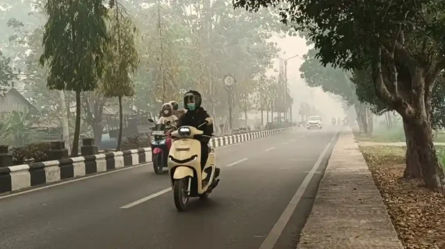 kabut asap akibat kebakaran hutan dan lahan